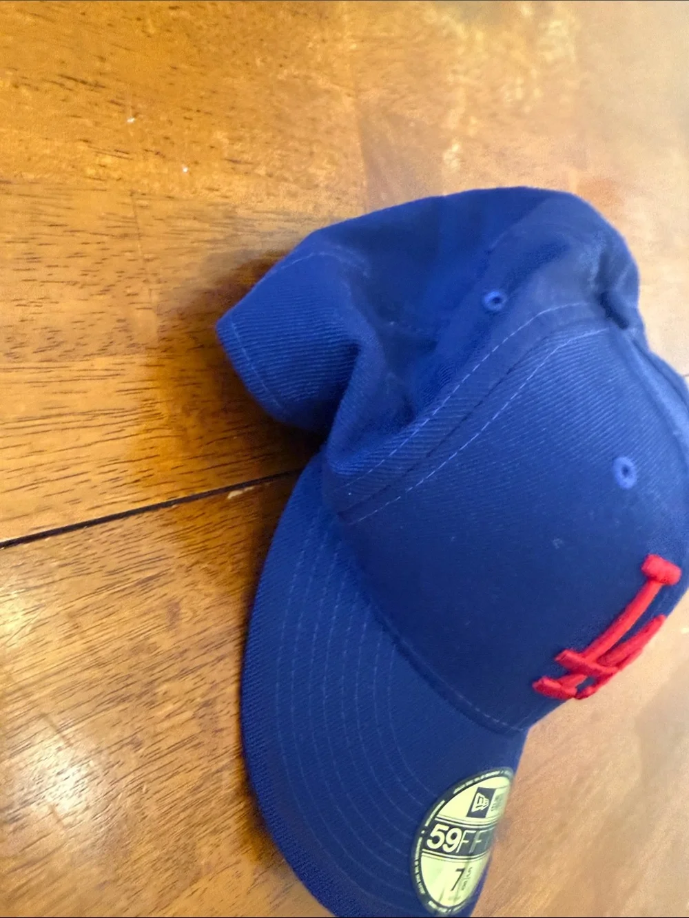New Era Royal Blue Cap with Red LA Emblem. 7 5/8